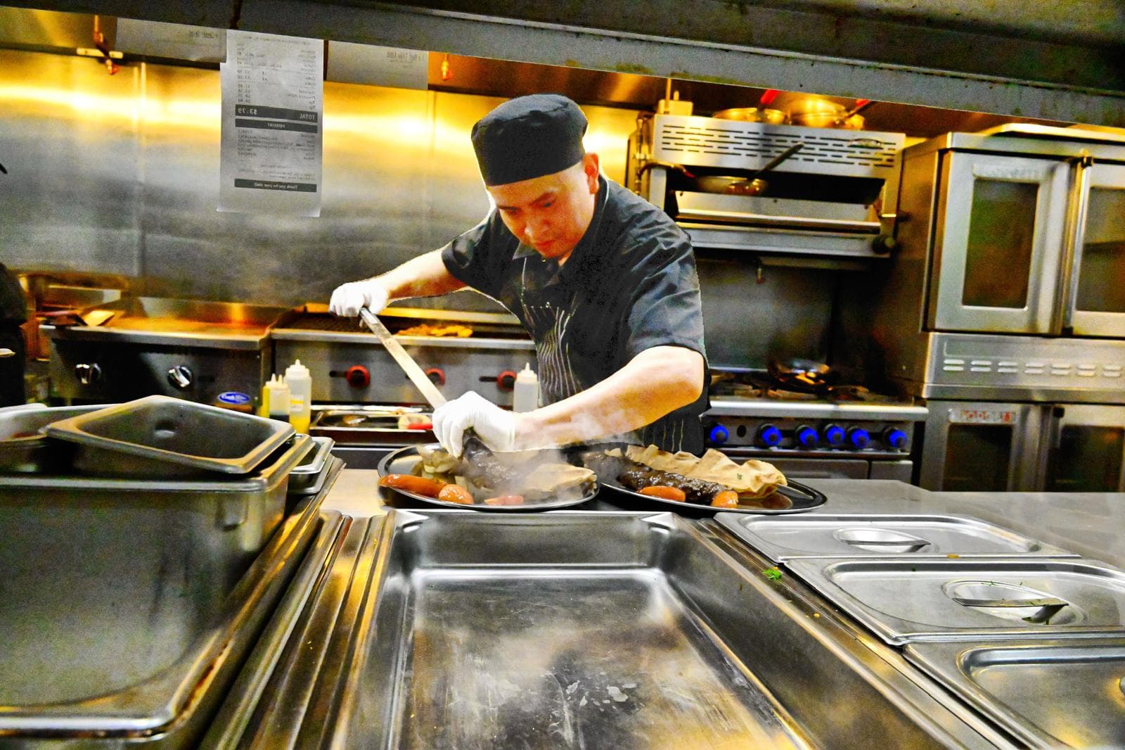 Koobideh Kebab being plated in the Mediterra kitchen